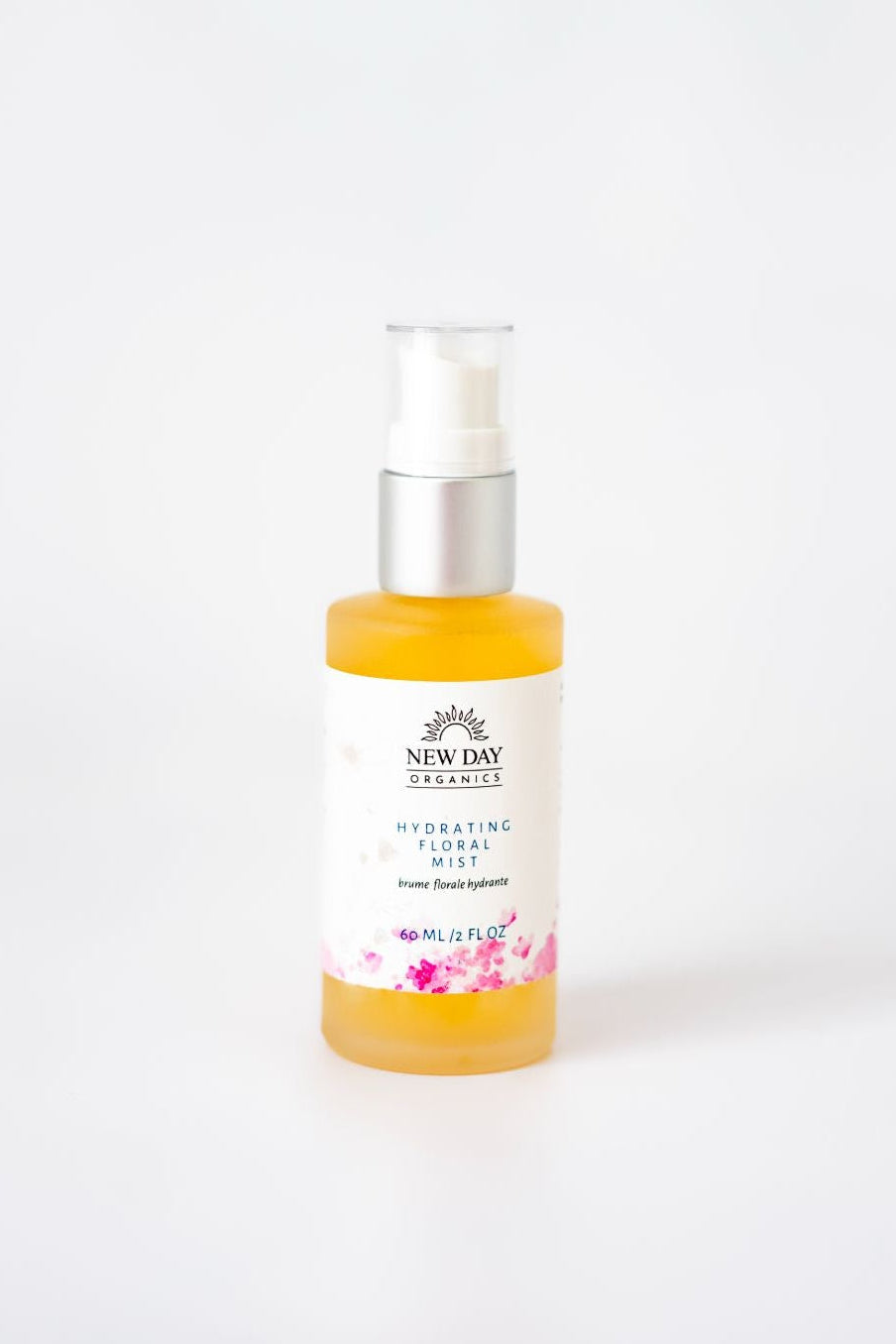 Bottle of New Day Organics Hydrating Facial Mist on a white background