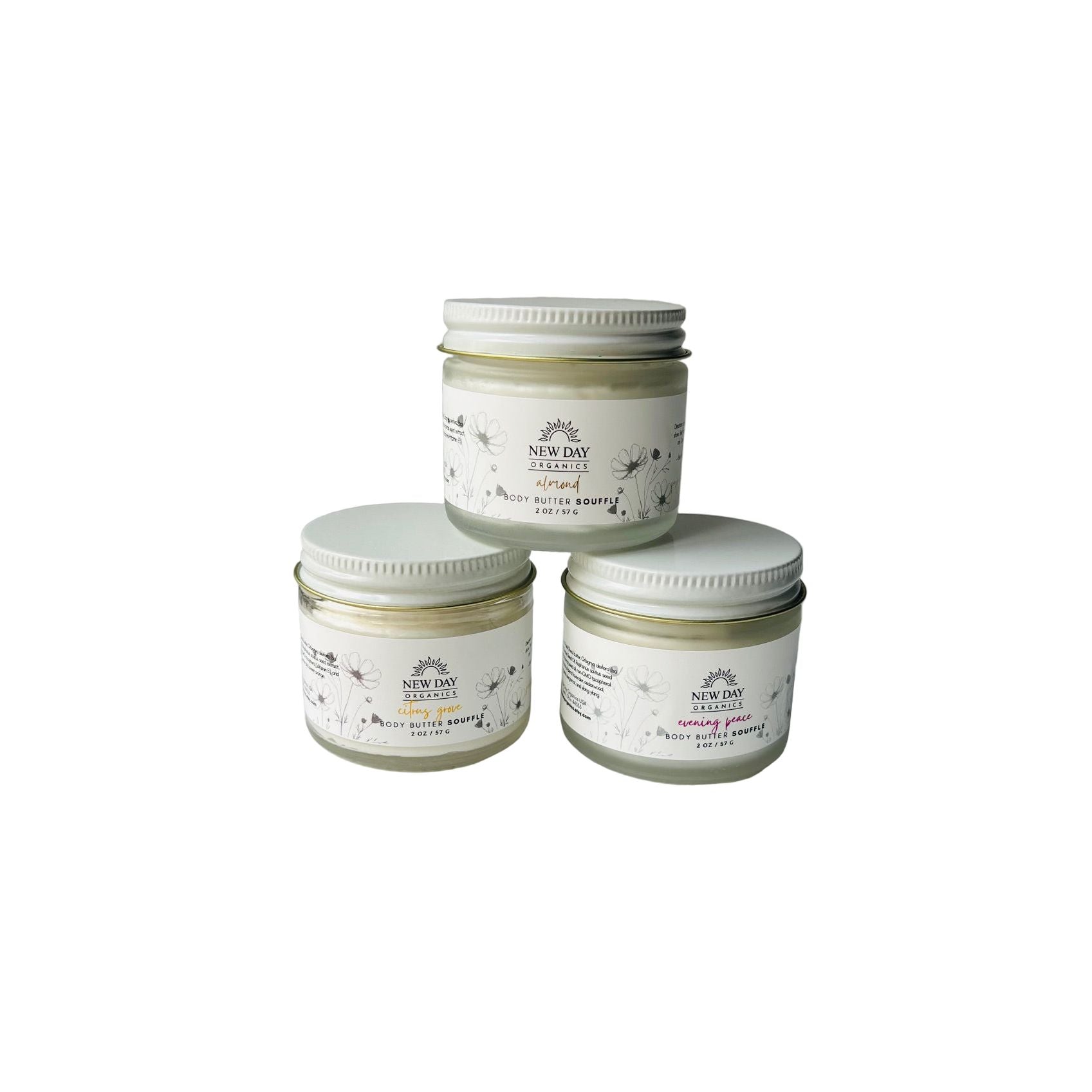 Three jars of New Day Naturals product on a textured surface with a neutral background