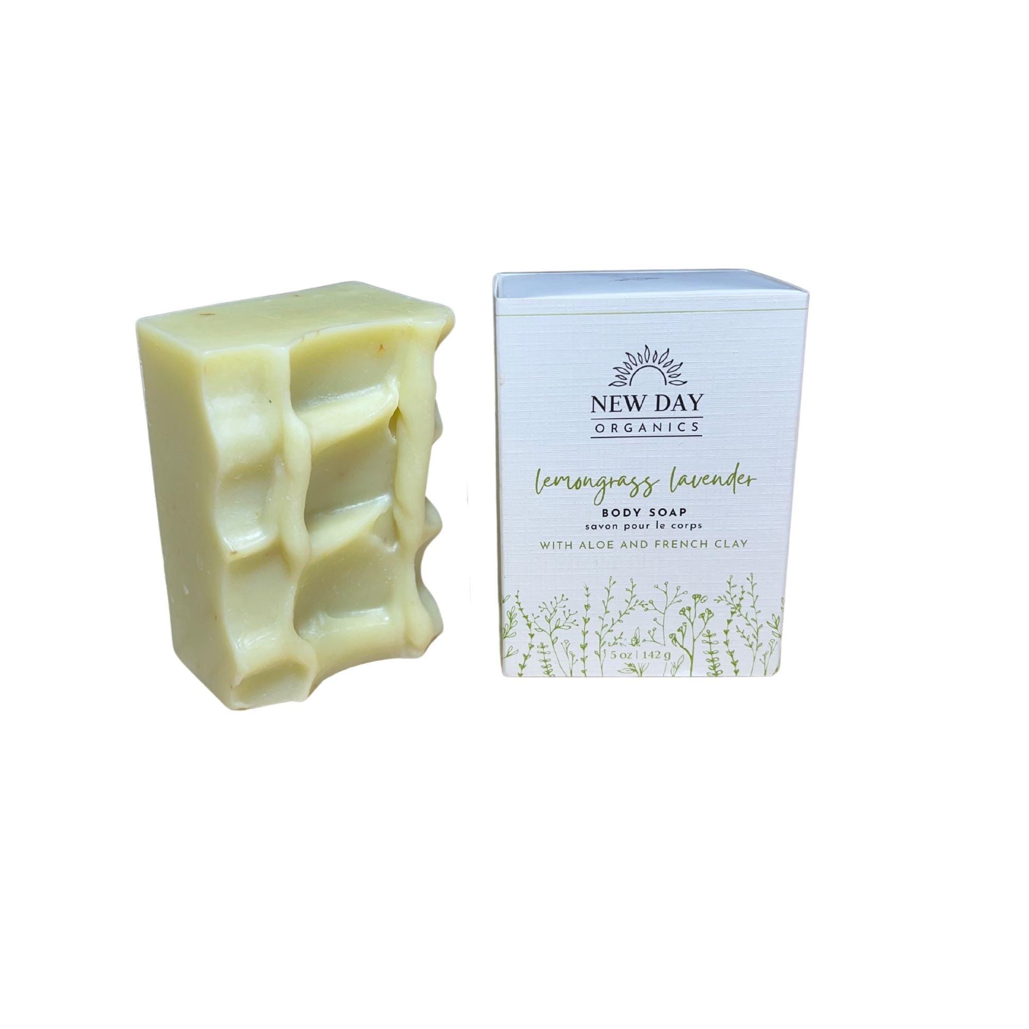 Bar of soap with packaging labeled 'New Day Organics' on a white background
