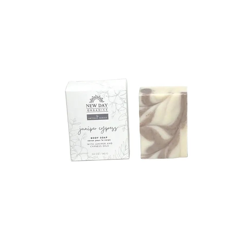 Bar of soap and its packaging on a white background